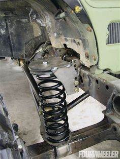 the front end of a vehicle with springs on it