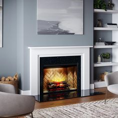 a living room filled with furniture and a fire place in the middle of the room