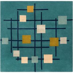 an area rug with squares and rectangles in blue, green, yellow and beige