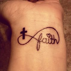 a tattoo with the word faith on it