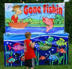 a young boy standing in front of a sign that says gone fishin