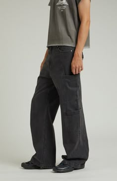 Step up your street style with the Black Extreme Baggy Cargo Jeans from PacSun. These jeans feature cargo patch pockets and button-flap back pockets, combining practicality with a bold aesthetic. The oversized wide-leg openings offer an extreme baggy fit that ensures comfort and movement throughout your day.Model is wearing a size 32Model Measurements: 6'3” Height, 32” Waist, 34” Inseam PacSun Mens Black Extreme Baggy Cargo Jeans size 29W 30L Men’s Baggy Pants, Colorado Trip Outfits, Black Baggy Jeans Men, Mens Baggy Pants, Apple Dance, Ftm Outfits, Cargo Jeans Outfit, Wide Leg Pants Men, Baggy Fashion