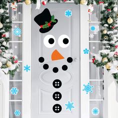 a door decorated with snowmen and christmas decorations