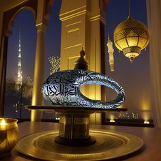 an intricately designed lamp on top of a table in front of a large window