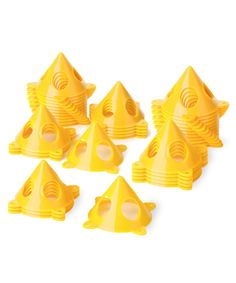 six yellow plastic cones with holes in them