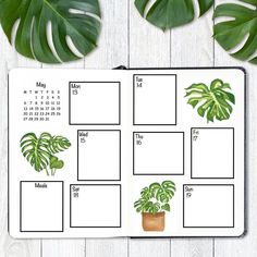 a calendar with plants and leaves on it