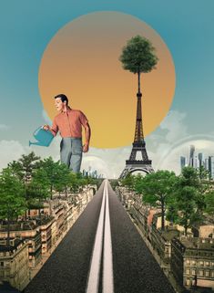 a man holding a watering can standing on an empty road in front of the eiffel tower