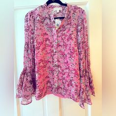 So Pretty! This Kors “Enchanted Bloom Top” In Hibiscus Features An All Over Floral Design Button Closure And Flared Sleeves. It’s A 2 For 1! Wear It With Jeans Or A Skirt! Pink Camisole Attaches With Snap But Can Be Worn Alone Too! The Sleeves And Detail Is Gorgeous! This Flouncy Sexy Girly Blouse And Cami Will Steal The Show! Michael Kors M Nwt Pink Floral Print Chiffon Tops, Pink Chiffon Blouse For Fall, Flowy Pink Chiffon Blouse, Elegant Floral Print Georgette Blouse, Elegant Georgette Blouse With Floral Print, Long Sleeve Georgette Blouse, Silk Pink Floral Print Blouse, Pink Silk Blouse With Floral Print, Pink Georgette Blouse For Summer