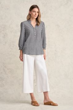 Feminine and sweet, our Cotton Gingham Blouse in Black and White is crafted from crinkle cotton making it comfortable and easy to wear. With an A-line silhouette this blouse is flattering and features both frill and shirring details. Step out in country-inspired style. Spring Plaid Linen Top, Plaid Linen Tops For Spring, Casual Gingham Blouse For Daywear, Chic Gingham Blouse For Work, Casual Gingham Tops For Work, Relaxed Fit Gingham Tops For Workwear, Gingham Blouse, Crinkle Cotton, Latest Colour