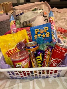 a white basket filled with snacks and candy