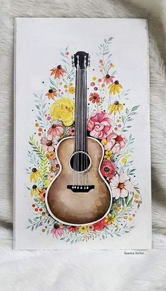 a watercolor painting of an acoustic guitar with flowers on the front and back side