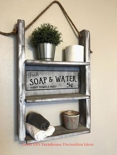 an old ladder is used as a shelf for soap and water, so it's easy to hang on the wall