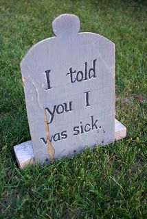 a tombstone sitting in the grass that says i told you 1 was sick