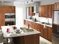 the kitchen is clean and ready to be used for dinner or other special occasion in someone's home