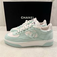 Please Message For Your Size And Availability Size:37 In Stock And Ready To Ship Heel Height 0.4 In Chanel Made In Italy Cc Logo On Side Lace Up Come In Original Box With Dust Bag Material: Cotton Color: Light Turquoise And White Run True To Size 2023 Collection New Please Ask For More Sizes Luxury Green Sneakers With Branded Insole, Luxury Green Low-top Sneakers, Designer Green Lace-up Sneakers, Luxury Green Custom Lace-up Sneakers, Luxury Custom Green Lace-up Sneakers, Designer Green Low-top Custom Sneakers, Green Luxury Low-top Custom Sneakers, Chanel 2024, Chanel Canvas