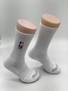 Description: Performance crew socks with memory yarns, anti-microbial wash, air-vents, compression padding. Kobe logo is embroidered. 37% TC Cotton, 58% Micro Polyester,1% Nylon, 3% Rubber, 1% Spandex. Sizes (Mens Shoe Sizes): M (4-8), L (8-12), XL (12-16) Comfortable Sweat-resistant White Socks, Comfortable Sweat Resistant White Socks, Comfortable White Sweat Resistant Socks, Breathable Comfortable Socks For Sports Events, White Antimicrobial Sports Socks, Comfortable Anti-odor Socks For Sports Events, Breathable Streetwear Socks, Comfortable Breathable Streetwear Socks, White Anti-odor Socks For Sports Events