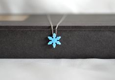 Silver Minimal Blue Opal Snowflake Necklace❄ You may choose it as a Christmas, anniversary, or birthday gift.🤍 Winter Special Gift Pack🎀 ✔Handmade daily snow necklace ✔925 sterling silver ✔Preserves its shine for a long time ✔Ready for shipping Material: 925 Sterling Silver Chain Color: Silver Width: 1 cm/ 0.39 in. Height: 1 cm/ 0.39 in. Chain length: 45 cm Weight: 1.50 gr If you have a question please don't hesitate to contact me.⛄ There is also a bracelet of the same product at the same pric Snow Necklace, Phoenix Necklace, Phoenix Pendant, Snowflake Necklace, Blue Evil Eye, Gift Pack, Evil Eye Pendant, Necklace Women, Evil Eye Charm