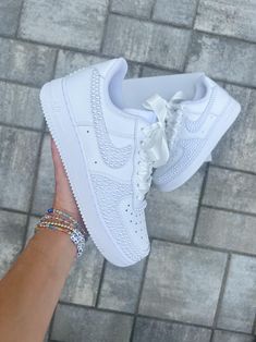 Blinged out bridal Air Force 1 sneakers personalized for the brides special day 👰🏻 **PLEASE READ LISTING CAREFULLY**  SNEAKERS: This listing if for Nike Air Force 1, if you would like something different please message me :) Personalization section please add: *your name  *date of wedding *if you want them without any customization please type (no customization) NOTE: A proof of your lettering will be sent to you within 72 hours of purchasing, please check your messages to approve image. If seller does not hear back within another 48 hours will proceed with shoes accordingly.  Price breakdown: *Full Shoe $290      -This option includes all white pearls on 4 Nike symbols both inner and outer sides, back heel and front toe area as shown in photos. This option is with regular laces. Name & Air Force 1 Wedding, Sneaker Wedding, Air Force Wedding, Wedding Shoes Sneakers, Bridal Sneakers, Nike Symbol, Wedding Sneakers, Engagement Party Wedding, Womens Wedding Shoes