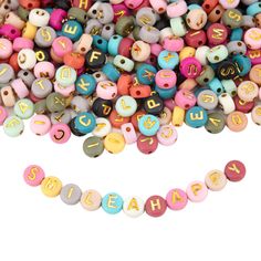 colorful beads with the word happy spelled on them