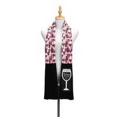 the wine glass scarf is hanging on a mannequin