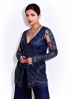 Dive into refined elegance with this midnight blue tonal hand-embroidered full sleeves kurta ensemble! Adorned with intricate hand embroidery, this kurta exudes sophistication and grace. Paired with georgette flared pants, it offers a contemporary yet timeless silhouette. Complete your look with a matching net dupatta for added charm. Step into effortless sophistication with this captivating attire, perfect for making a statement at any special occasion. Embroidered Sharara, Embroidered Pants, Sharara Set, Net Dupatta, Western Wedding, Flared Pants, Wedding Service, Short Suit, Full Sleeves