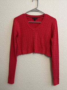 Great cropped sweater from Tommy Hilfiger in a dark hot pink, cable knit, raw hem, light weight, size small. This top is preowned and in excellent condition. armpit to armpit - 20" armpit to hem - 8" armpit to cuff - 20" Tommy Hilfiger V-neck Winter Top, Tommy Hilfiger Long Sleeve Sweater For Spring, Tommy Hilfiger Casual Knit Tops, Shameless Dr, Woolen Tops, Outfit Choices, Hot Pink Sweater, Sweater Crop, Crop Top Sweater