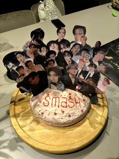 a cake that has been decorated with photos and the words sams on it is sitting on a wooden plate