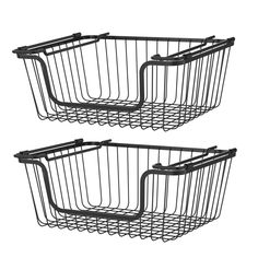 two black wire baskets sitting next to each other