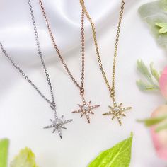 "This listing is for one rhodium, rose gold, or gold plated cubic zirconia faux pearl starburst charm necklace with adjustable/resizable stainless steel chain. Each charm has a brass base and plated with real rhodium, rose gold, or gold. The chains are tarnish-resistant stainless steel - the rose gold and gold chain options are plated with real rose gold or gold. The approximate dimensions of each charm are 0.75\" long x 0.75\" wide. The length of each necklace is 16.5\" with a 3.5\" extension, Adjustable Sparkling Gold Necklace, Adjustable Cubic Zirconia Clavicle Necklace, Adjustable Dainty Star Jewelry, Adjustable Rose Gold Metal Necklace, Delicate Silver Jewelry With Adjustable Length, Rose Gold Stainless Steel Pendant Jewelry, Rose Gold Stainless Steel Pendant, Adjustable Delicate Jewelry With Star Charm, Silver Dainty Jewelry With Adjustable Length