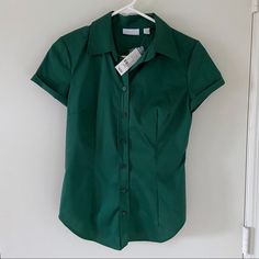 Dark Green Color, Short Sleeve Button Down In New With Tags! Great For The Office! Green Fitted Button-up Shirt, Fitted Green Office Shirt, Green Slim Fit Workwear Shirt, Green Slim Fit Shirt For Work, Green Workwear Shirt With Buttons, Green Short Sleeve Tops For Business Casual, Green Slim Fit Tops For Work, Office Wear Short Sleeve Shirt, Fitted Snap Button-up Shirt