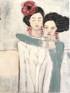 two women are hugging each other in front of a painting with flowers on the wall