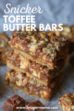 three pieces of chocolate peanut butter bars stacked on top of each other with the words, snickker toffe butter bars