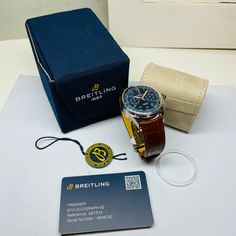 Excellent Condition. Almost Indistinguishable from New. includes All Original Boxes, Papers, Hang Tag, Bezel Protector, Digital Warranty Card from Breitling. 1 Owner Watch COSC 4606742 AB1510 Paying homage to three generations of inventors – Léon, Gaston & Willy Breitling – the Premier Duograph displays Breitling’s watchmaking expertise with its split second complication. As Willy Breitling said, the Premier is an “unmistakable stamp of impeccable taste”. This latest generation of Premier chrono Breitling 1884, Split Second, Inventors, Hang Tags, Blue Leather, Original Box, Split, Stamp, Leather