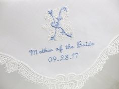 "Lovely White Wedding handkerchief personalized with Classic Zundt 1-Intiial Monogram, Mother of the Bride and your wedding date. What an exquisite lace handkerchief for the Mother of the Bride/ Mother of the Groom! Handkerchief Color Shown: White Handkerchief Size~~Approx. 11\"x11\" Embroidery Color Shown: Grey blue color Initial on ivory color scroll work, grey blue title and date Please include the following personalization information in the \"Message to Seller\" during the checkout process: Groom Handkerchief, Personalized Handkerchiefs, Lace Handkerchief, Wedding Hankies, Wedding Handkerchief, Groom Gift, Morning Wedding, Monogram Wedding, Mother Of The Groom