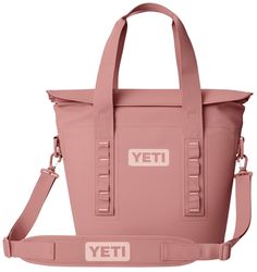 a pink tote bag with the word yet on it and two straps hanging down