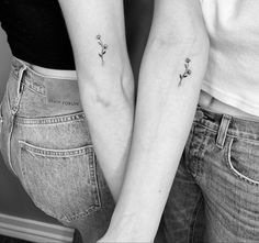 Here are 21 best friend flower tattoos to help spark some inspiration for your next trip to the tattoo studio. Small Matching Tattoos Flowers, Friendship Tattoos For 2 Best Friends, Sister Tattoos Dainty, Friendship Tattoos Flowers, Minimalist Matching Tattoos Sister, Tiny Matching Tattoos Bff Best Friends, Delicate Matching Tattoos, Sister Simple Tattoos, Small Matching Sister Tattoos For 2