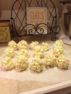 there are some popcorn balls on the counter