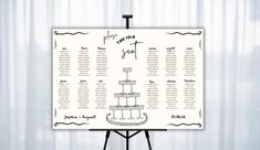 a wedding seating chart on top of a easel