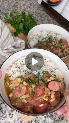 two bowls filled with food on top of a table