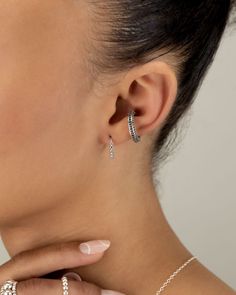 Beautiful ear cuffs that feature high quality stones that add the perfect pop of color! Easy to put on and take off & comfy to wear!  Add these pretty cuffs to any outfit. No piercing needed. DETAILS High polish ear cuffs with micro pave cz and colored stones Adjustable Nickel-free No piercing needed Not just an ear cuff!  Wear as a faux piercing - nose, septum, lip, conch, lobe, traguitems in your order, daith, etc.   Easily create new looks with this beautiful accessory ;-) Sold separately or Party Huggie Single Earring, Party Single Huggie Earring, Dainty Silver Cartilage Earrings For Party, Silver Cubic Zirconia Huggie Ear Cuff, Adjustable Single Cartilage Earring For Parties, Single Cubic Zirconia Cartilage Earring For Party, Silver Dainty Ear Climbers For Party, Dainty Silver Ear Climbers For Party, Trendy Silver Huggie Ear Cuff