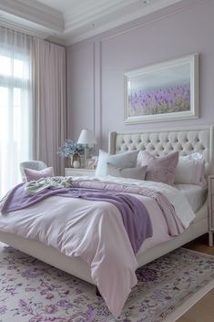 a bedroom with purple walls and white bedding in the center, along with a rug on the floor