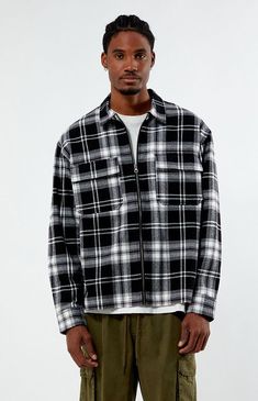 Add a lightweight layer with the Full Zip Flannel Shirt from PacSun. This flannel shirt has a collared neckline, long sleeves, spacious pockets at the chest, a full zip closure, and a plaid pattern throughout.Collared necklineLong sleevesDual chest pocketsFull zip closurePlaid patternStraight hem100% CottonMachine washableModel is wearing size mediumModel Measurements: 6'1â Height, 31â Waist, 32â Inseam PacSun Mens Black Full Zip Flannel Shirt size XL