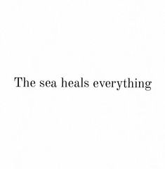 the sea heals everything quote on white background with black text overlaying it