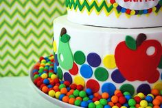 two tiered birthday cake decorated with colorful candies