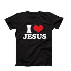 "I love Jesus T-Shirt, Christian Tee, I Heart Jesus T-Shirt, Faith-inspired Shirt, Christian Gift idea, Jesus Christ Tee, Love Jesus Tee Are you in search of a unique and personalized custom t-shirt? Well, your search ends here! We take immense pride in offering the widest range of I heart t-shirts available on the internet. But that's not all - if you don't find something that catches your eye, fret not! We would be absolutely delighted to customize a flawless I heart tee just for you. Simply c Black Slogan T-shirt For Valentine's Day, Valentine's Day Black Slogan T-shirt, Valentine's Day Black T-shirt With Text Print, Valentine's Day Black T-shirt With Slogan, Black Graphic Tee For Valentine's Day, Black Top With Funny Text For Valentine's Day, Funny Text Black Top For Valentine's Day, Valentine's Day Graphic Tee With Text Print, Valentine's Day Short Sleeve Slogan T-shirt