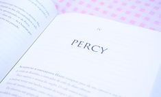 an open book with the word percy written on it