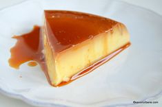 a piece of caramel cheesecake on a white plate