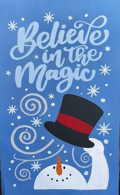 a sign that says believe in the magic with a snowman wearing a top hat