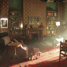 a living room filled with furniture and bookshelves