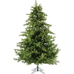 a small green christmas tree sitting on top of a metal stand